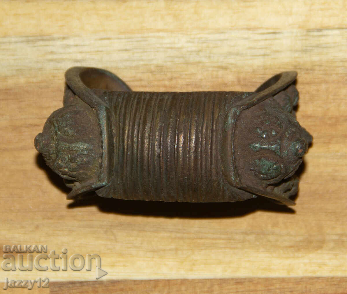 Old bronze slingshot bracelet with price 220.00 BGN | € 112.48