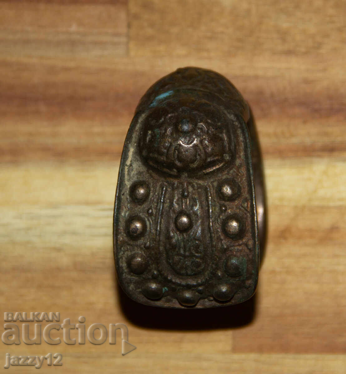 Delivery of Old bronze bracelet slingshot with cross