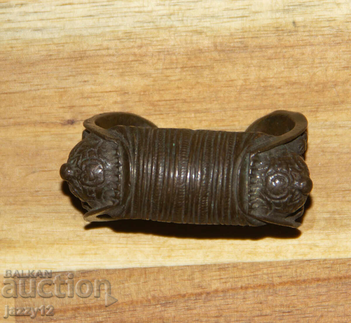 Old bronze slingshot bracelet with price 220.00 BGN | € 112.48