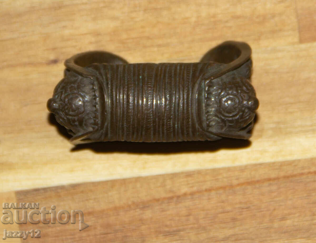 Old bronze slingshot bracelet