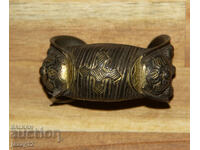 Brățară veche de bronz, tip praștie, cu cruce