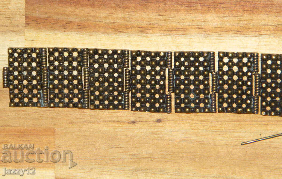 Delivery of Old traditional bronze bracelet