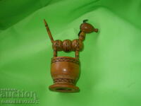 Old wooden toy Donkey moves tail, bows