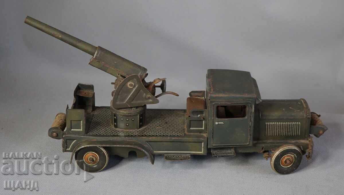 Аукцион Типко 1930 Метална механична играчка Военен Камион Гаубица Аукцион Типко 1930 Метална механична играчка Военен Камион Гаубица
