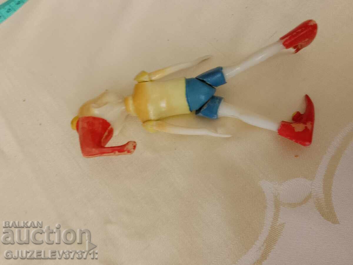 Auction Vintage old Pinocchio toy with moving eyes, hard plastic Auction Vintage old Pinocchio toy with moving eyes, hard plastic
