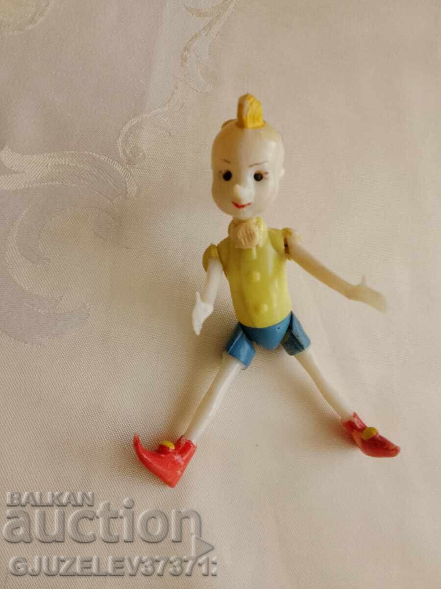 Vintage old Pinocchio toy with moving eyes, hard plastic Vintage old Pinocchio toy with moving eyes, hard plastic