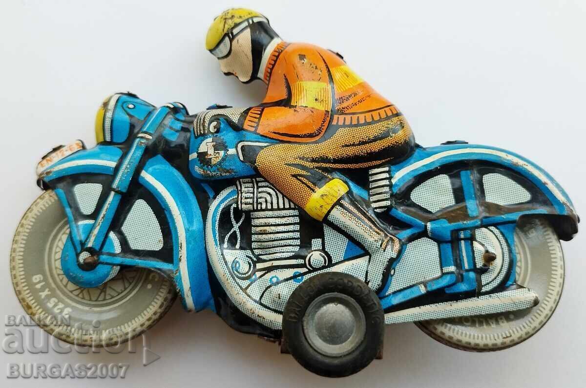Jucărie veche de tablă, motocicletă