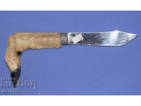 Solid hunting knife with a hoof handle