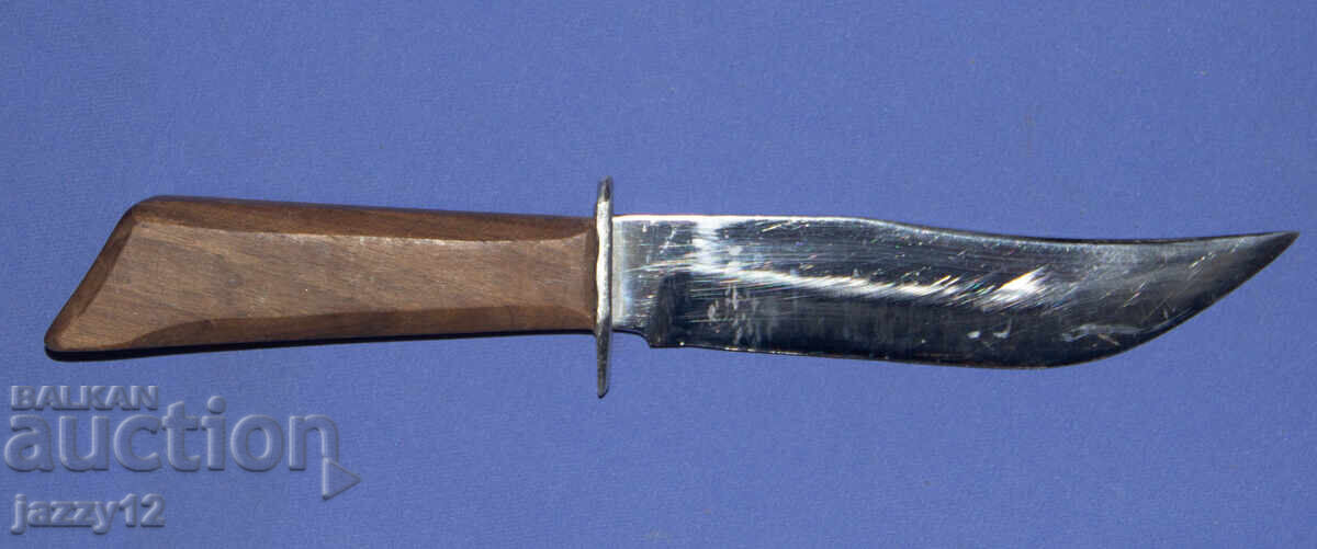 Auction Solid hunting knife with a wooden handle Auction Solid hunting knife with a wooden handle