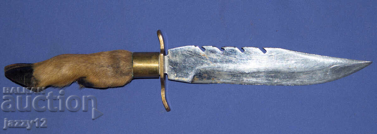 Solid hunting knife with a hoof handle