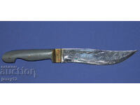 Solid handmade hunting knife with a wooden handle