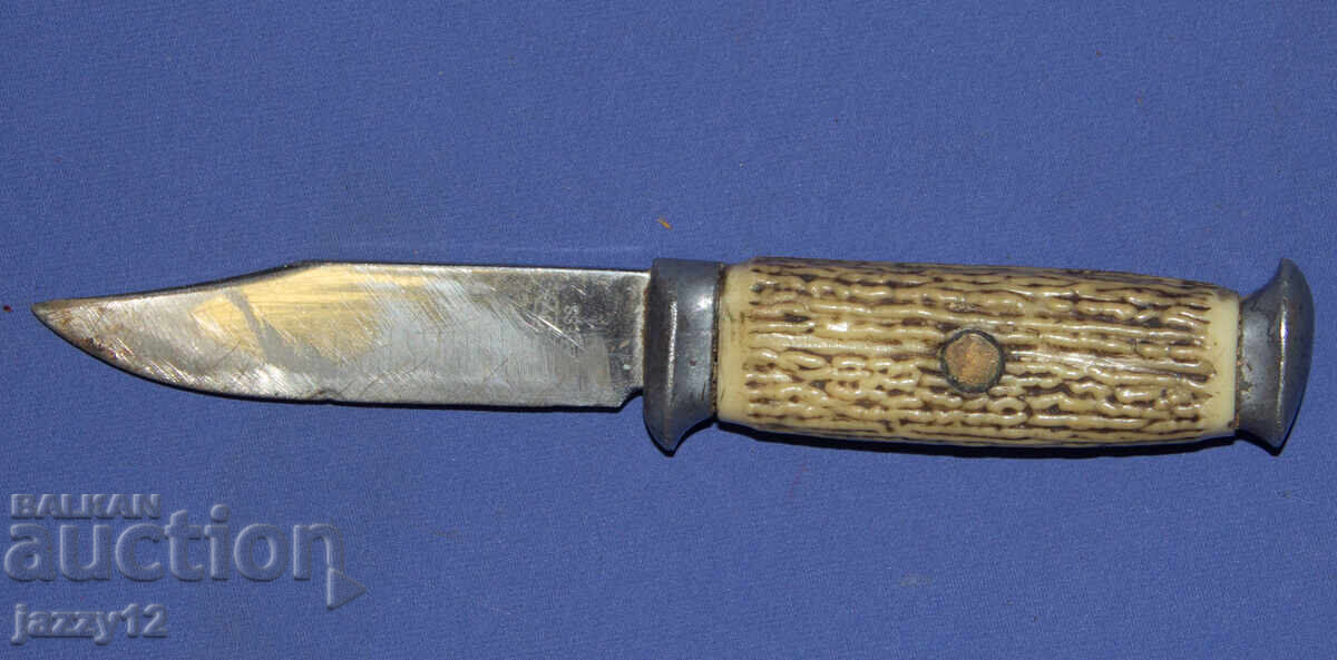 Delivery of Old tourist/hunting knife with a horn handle Delivery of Old tourist/hunting knife with a horn handle