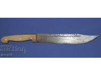 Solid handmade hunting knife with a wooden handle