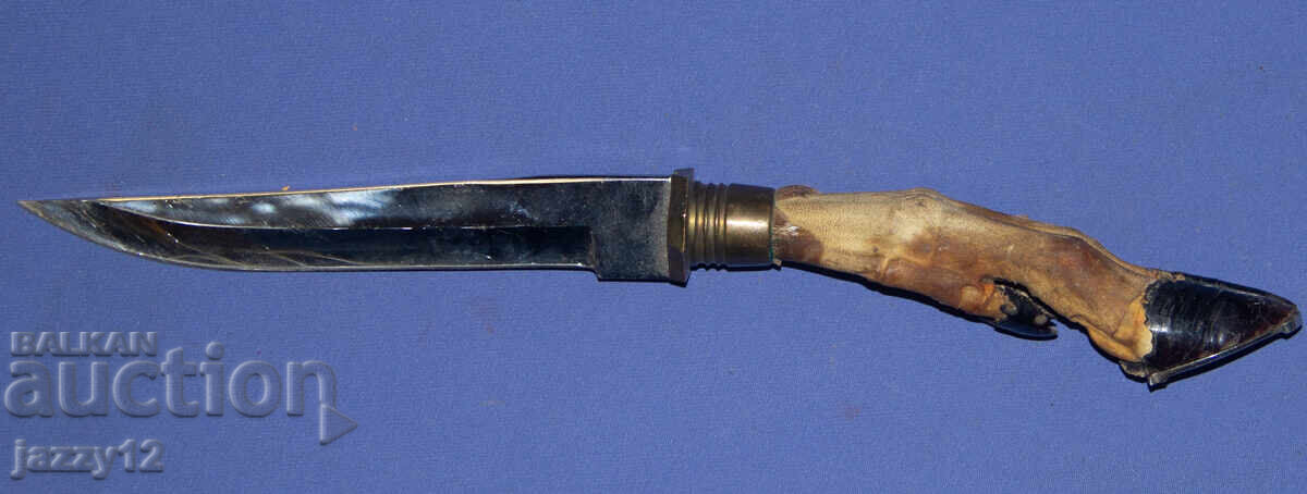 Delivery of Solid hunting knife with a hoof handle