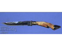 Solid hunting knife with a hoof handle