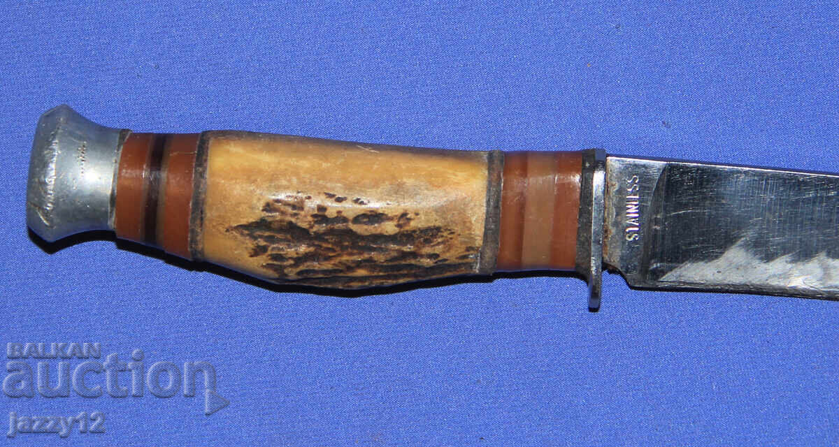 Auction  Tourist/hunting knife with a horn handle