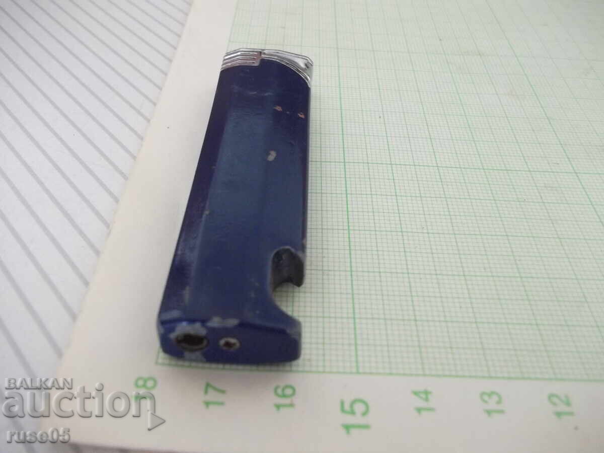 Lighter bottle opener gas piezo crystal with soft flame working with price 5.00 BGN | € 2.56