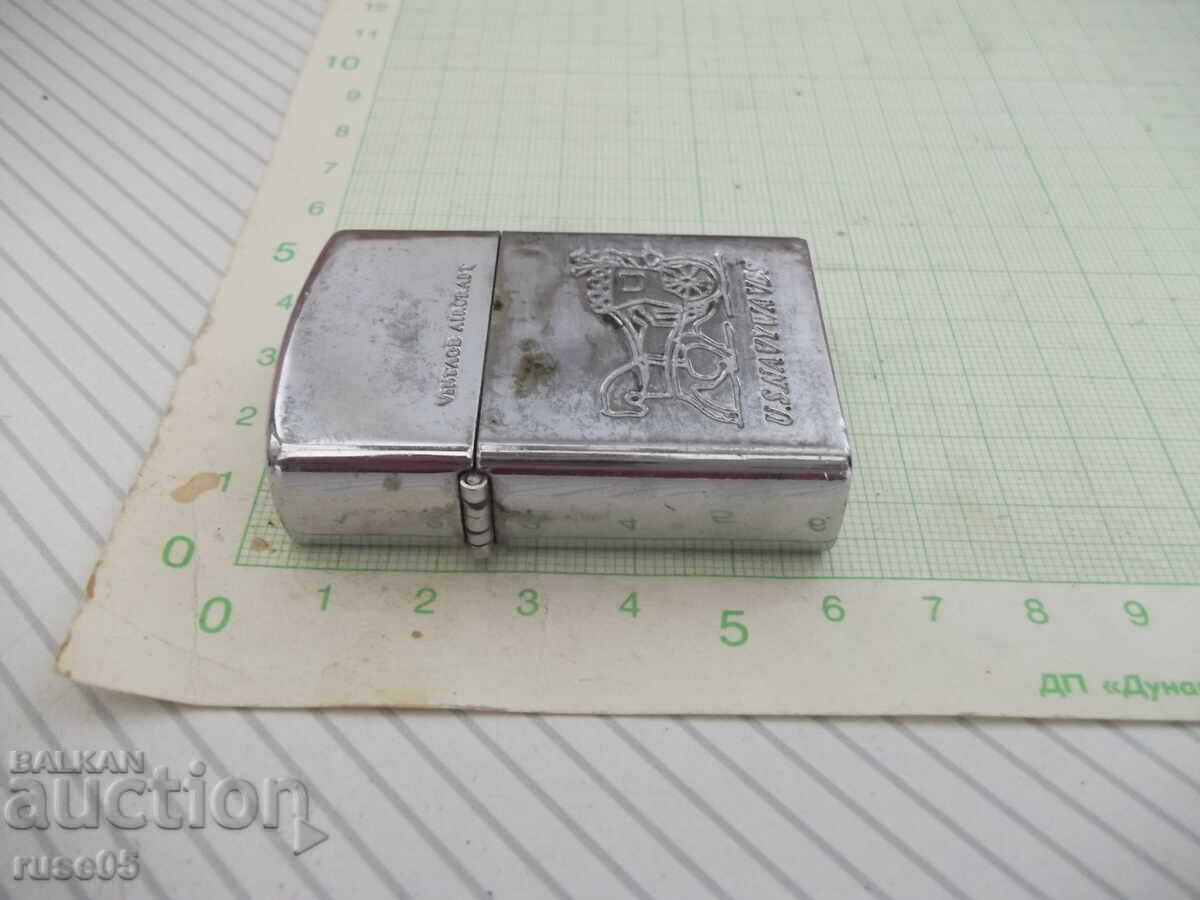 Livrarea Brichetă "TEAM PISTOL - U.S. NAVYWA VBS" pe benzină funcțională