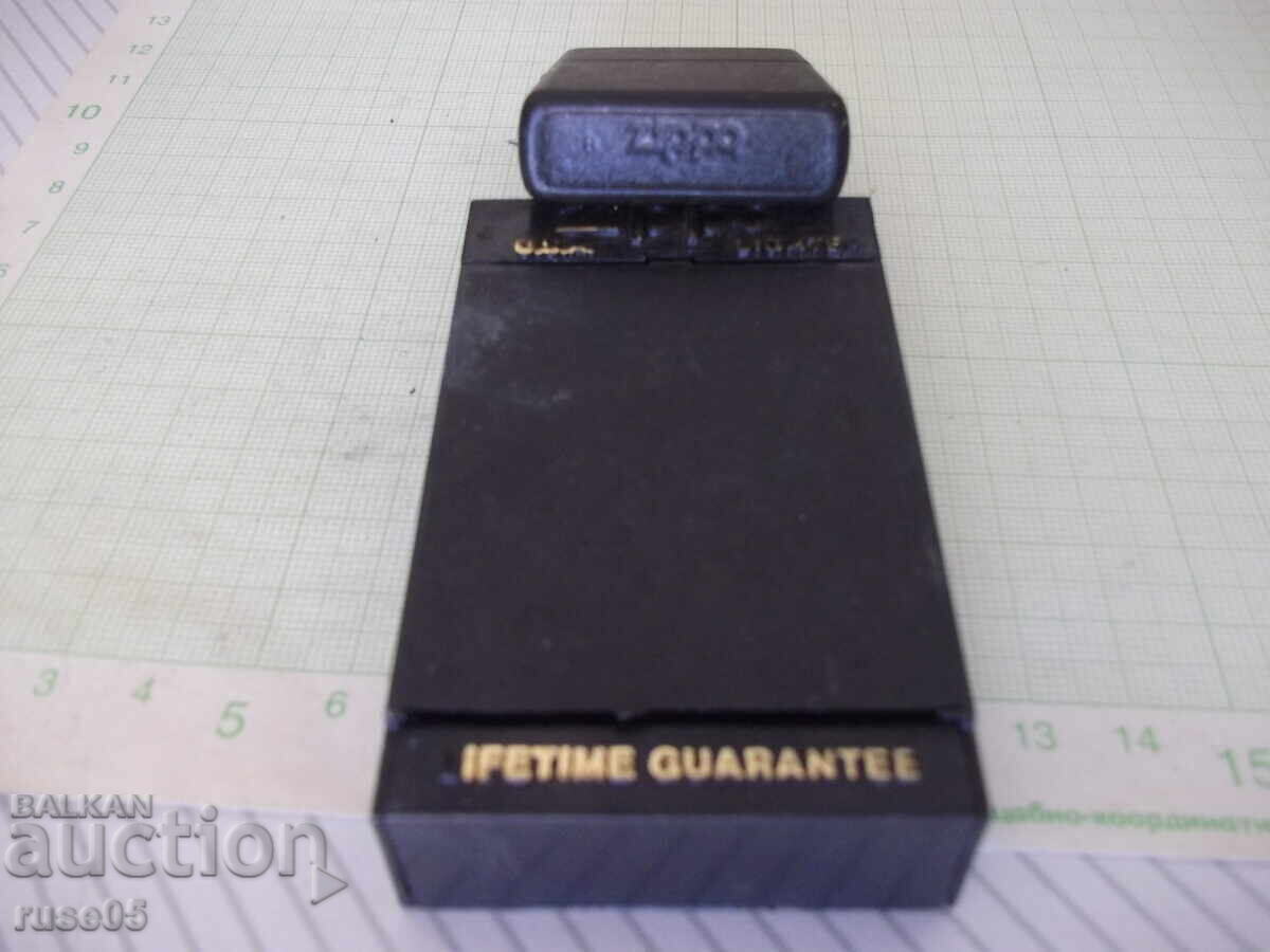 Zippo petrol lighter, black, with working flint with price 25.00 BGN | € 12.78
