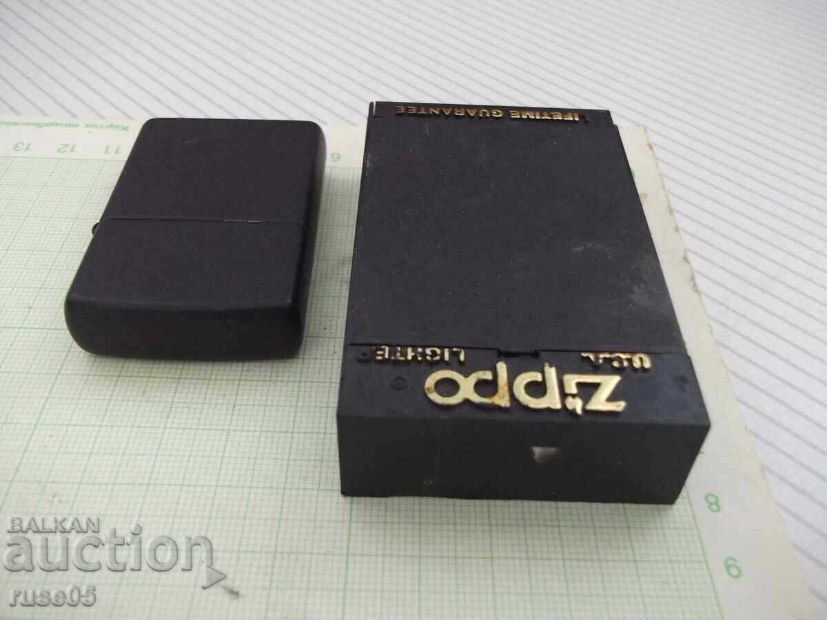 Delivery of Zippo petrol lighter, black, with working flint