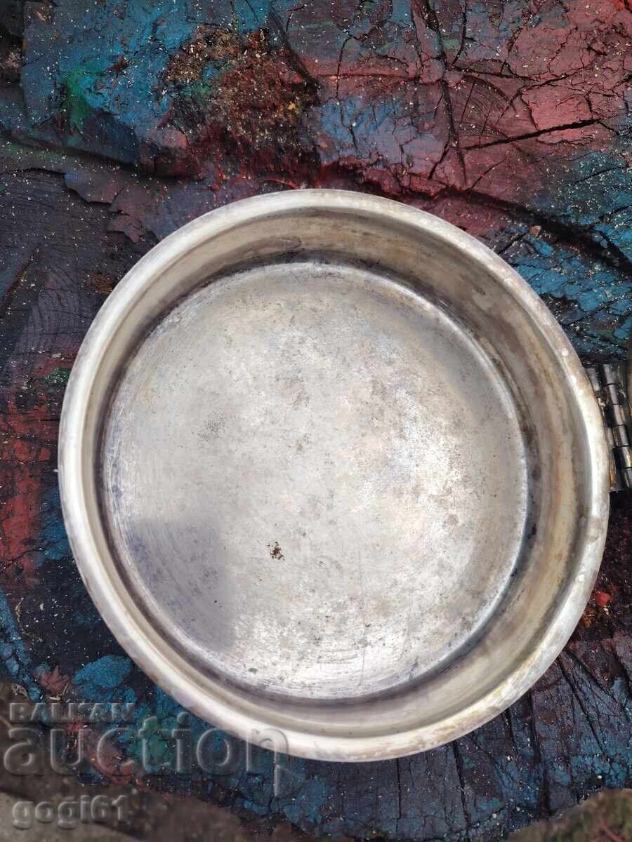 Delivery of Small, silver-plated, branded frying pan