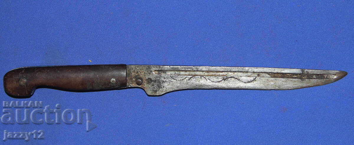 Old knife with ornaments and brass elements with price 130.00 BGN | € 66.47