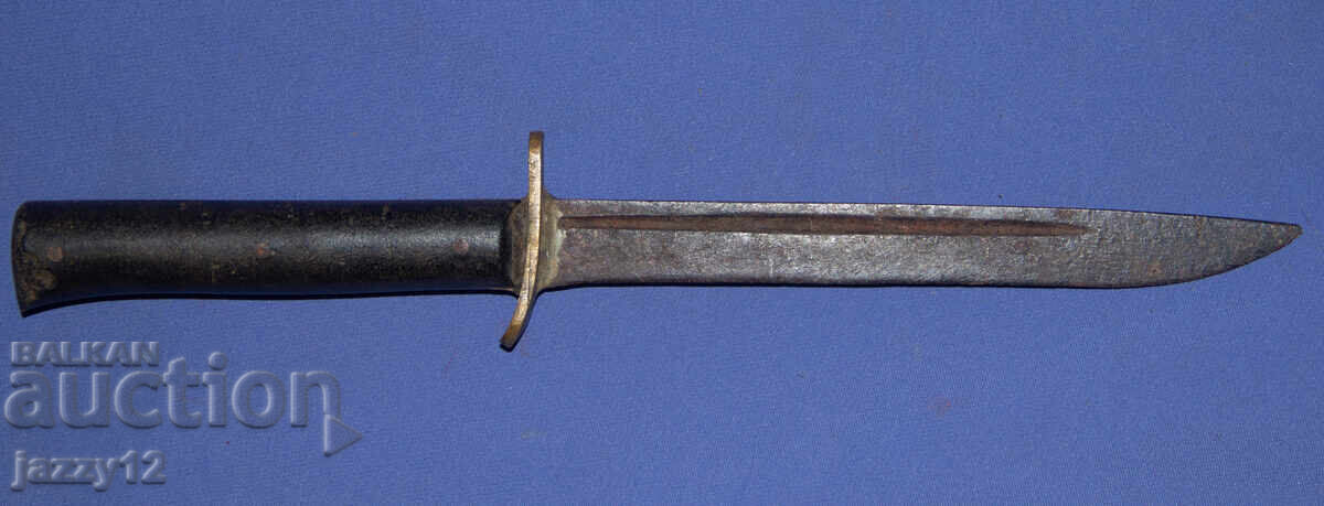 Auction  Old knife with brass elements