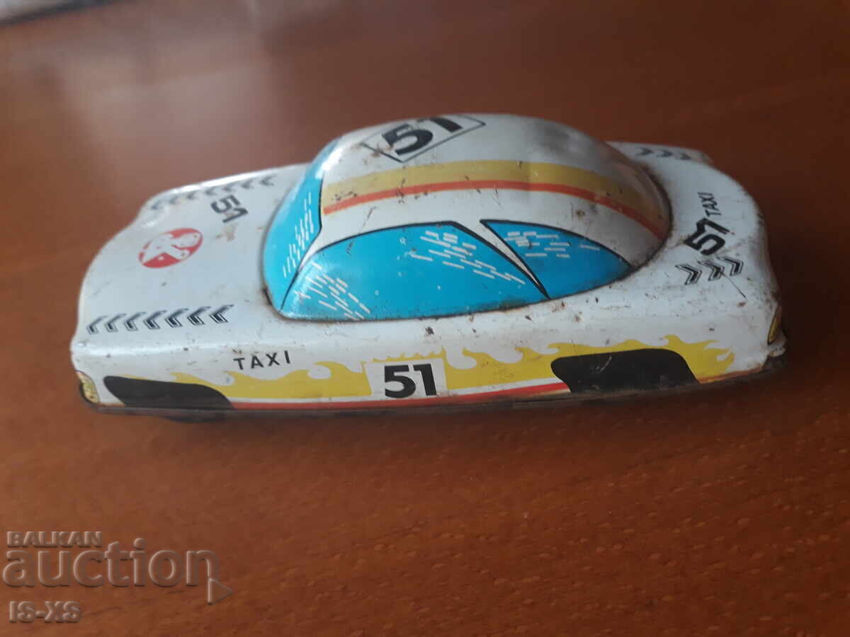 Auction Laminated car - TAXI 60s of the XX century Auction Laminated car - TAXI 60s of the XX century