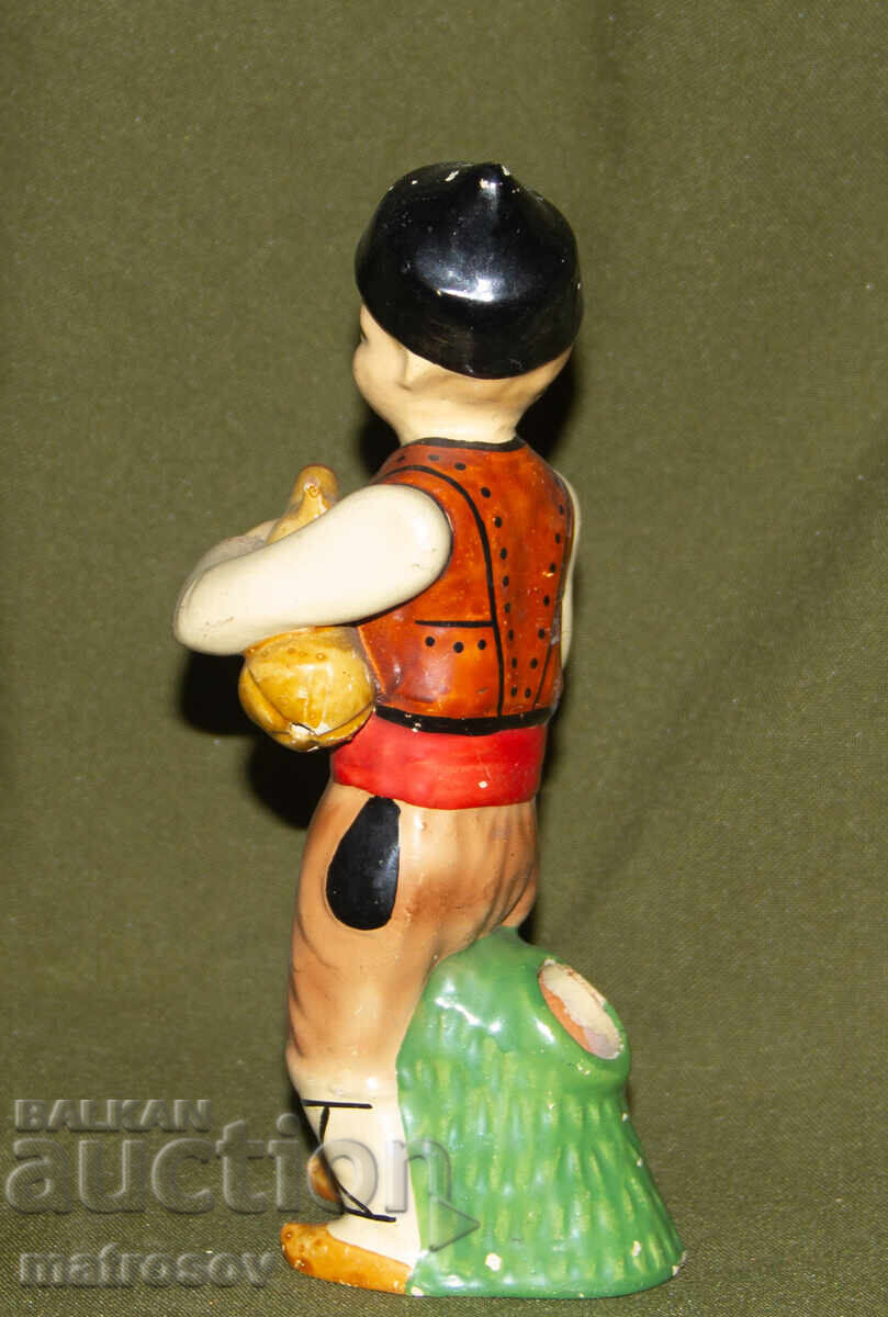 Delivery of Decorative porcelain figurine, bagpiper
