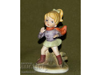 Statuetă veche din porțelan, fetiță pe patine