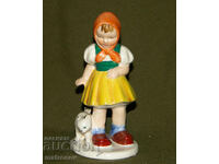 Figurină veche de porțelan, fetiță cu pisicuță