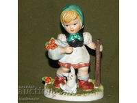 Figurină veche de porțelan cu fetiță și iepuraș