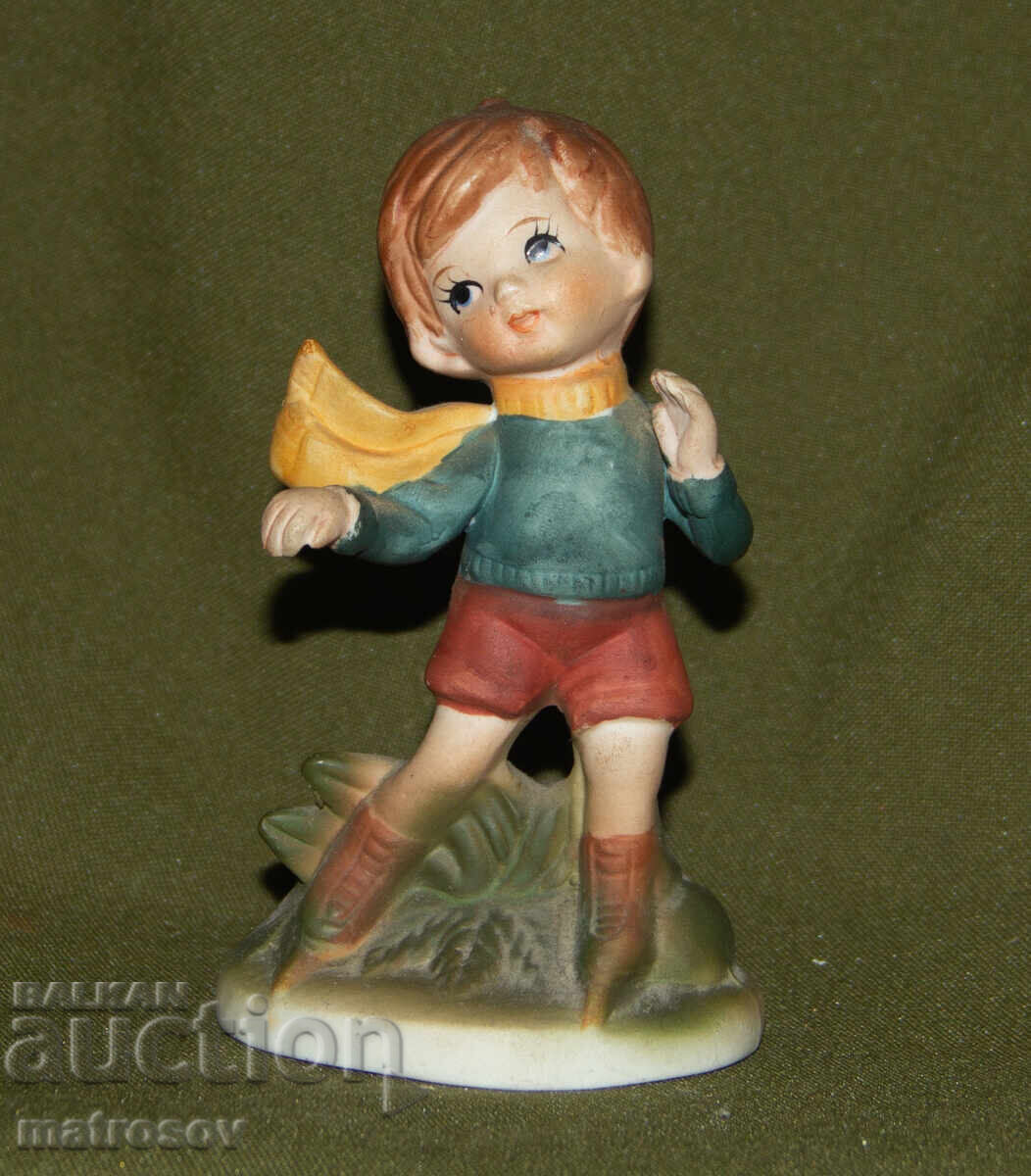 Old porcelain figurine, child on skates with price 100.00 BGN | € 51.13