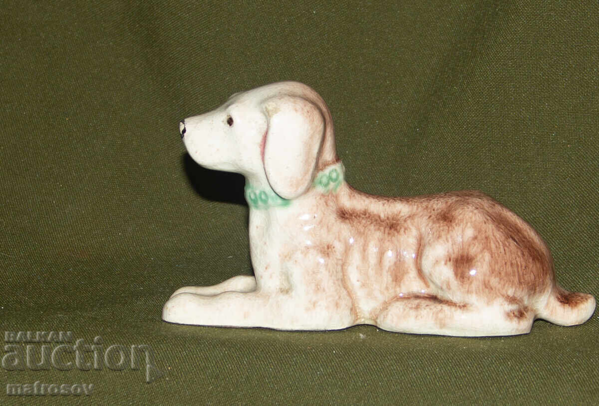 Delivery of Old porcelain figurine, dog