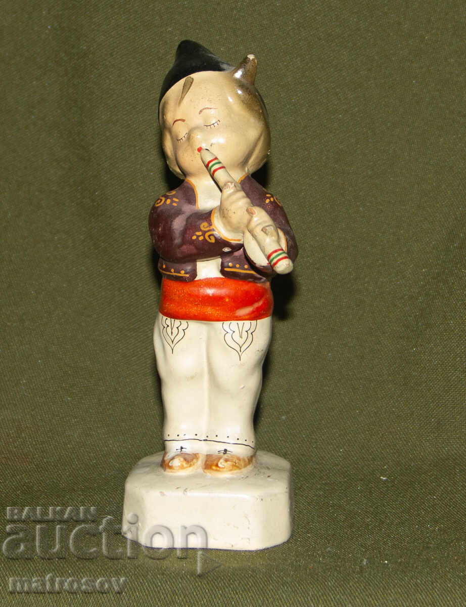 Licitație Figurină decorativă din porțelan, băiat cu fluier Licitație Figurină decorativă din porțelan, băiat cu fluier