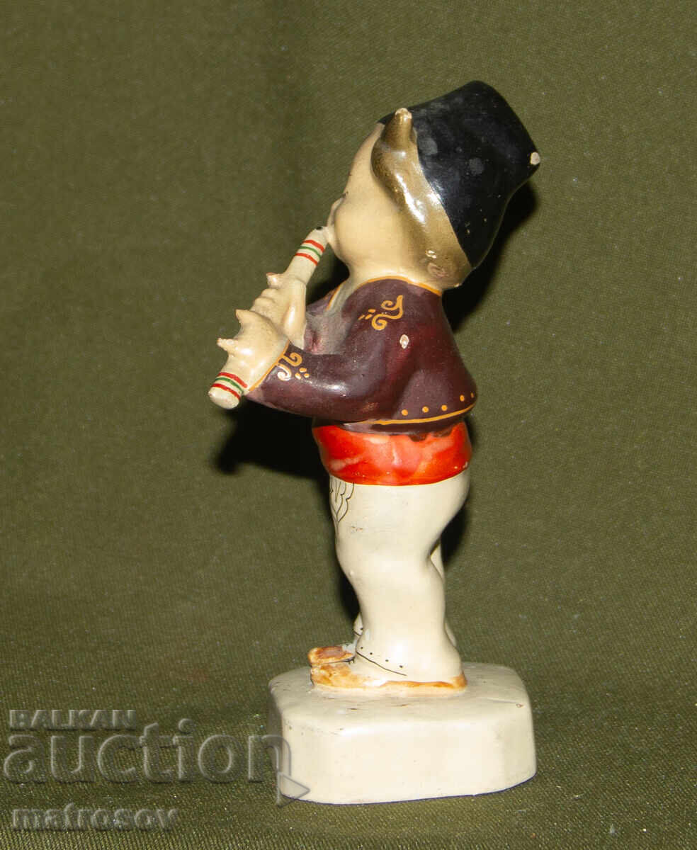 Livrarea Figurină decorativă din porțelan, băiat cu fluier Livrarea Figurină decorativă din porțelan, băiat cu fluier