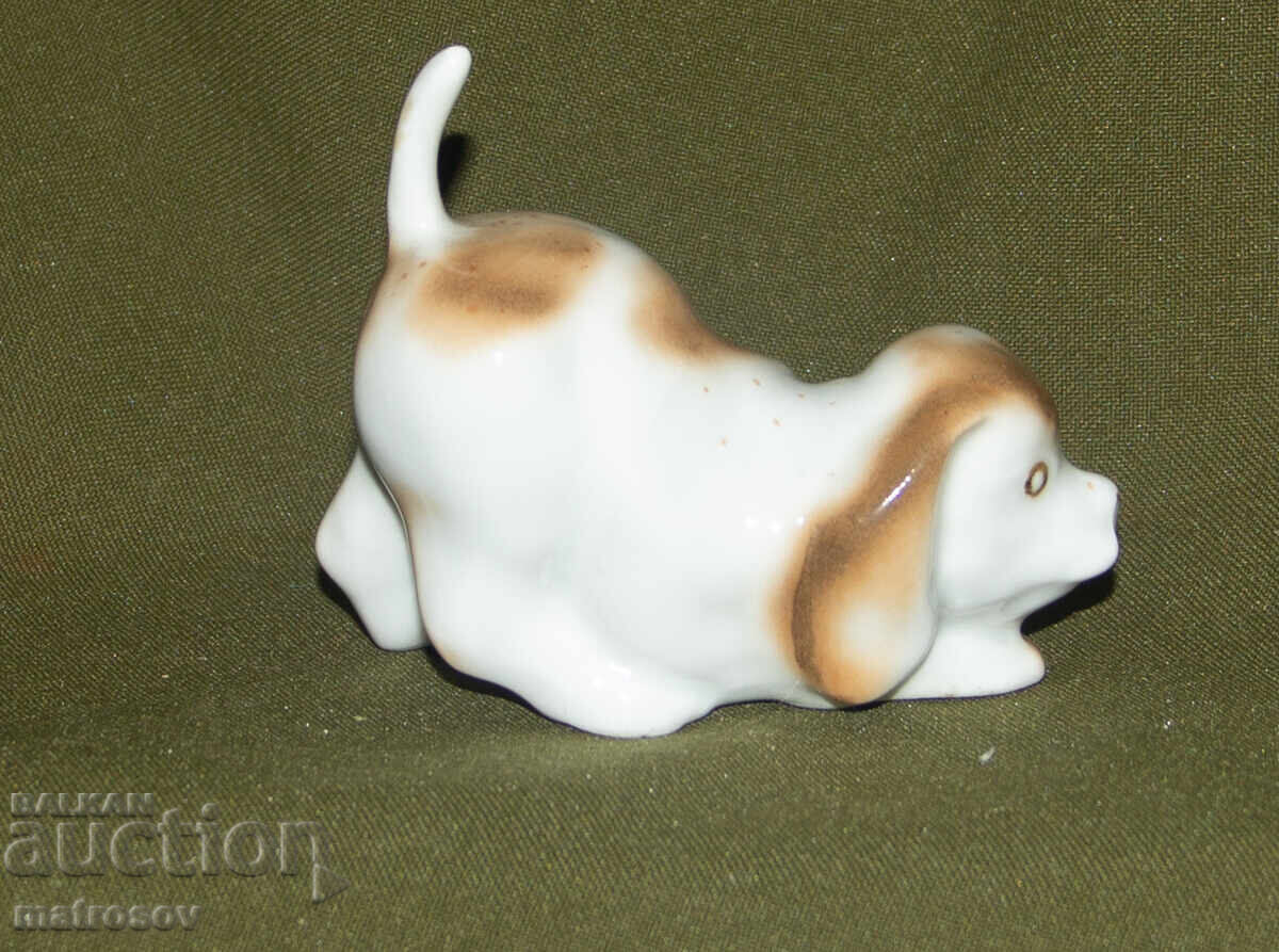 Delivery of Old porcelain figurine, puppy