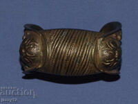 Brățară veche de bronz tip praștie