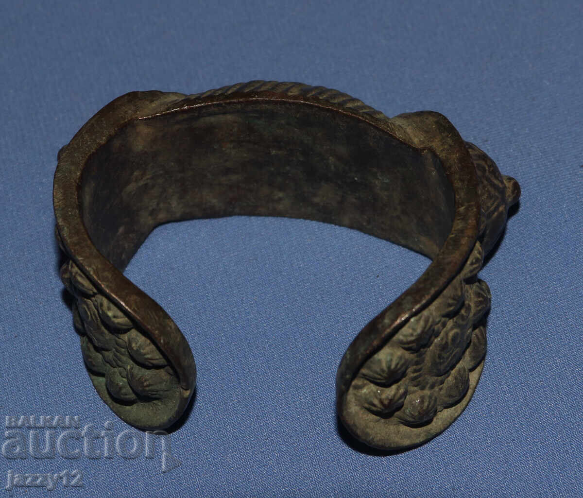 Delivery of Old bronze bracelet slingshot with cross Delivery of Old bronze bracelet slingshot with cross