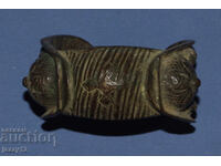 Brățară veche de bronz, tip praștie, cu cruce