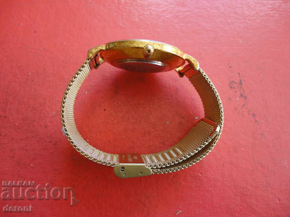 Auction  Great gold-plated Q&Q watch