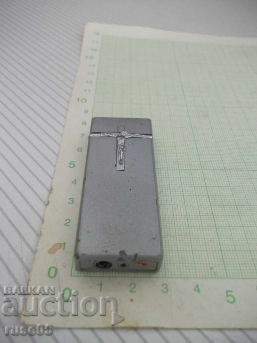 Auction Gas lighter with crucifix, piezoelectric, with jet flame Auction Gas lighter with crucifix, piezoelectric, with jet flame