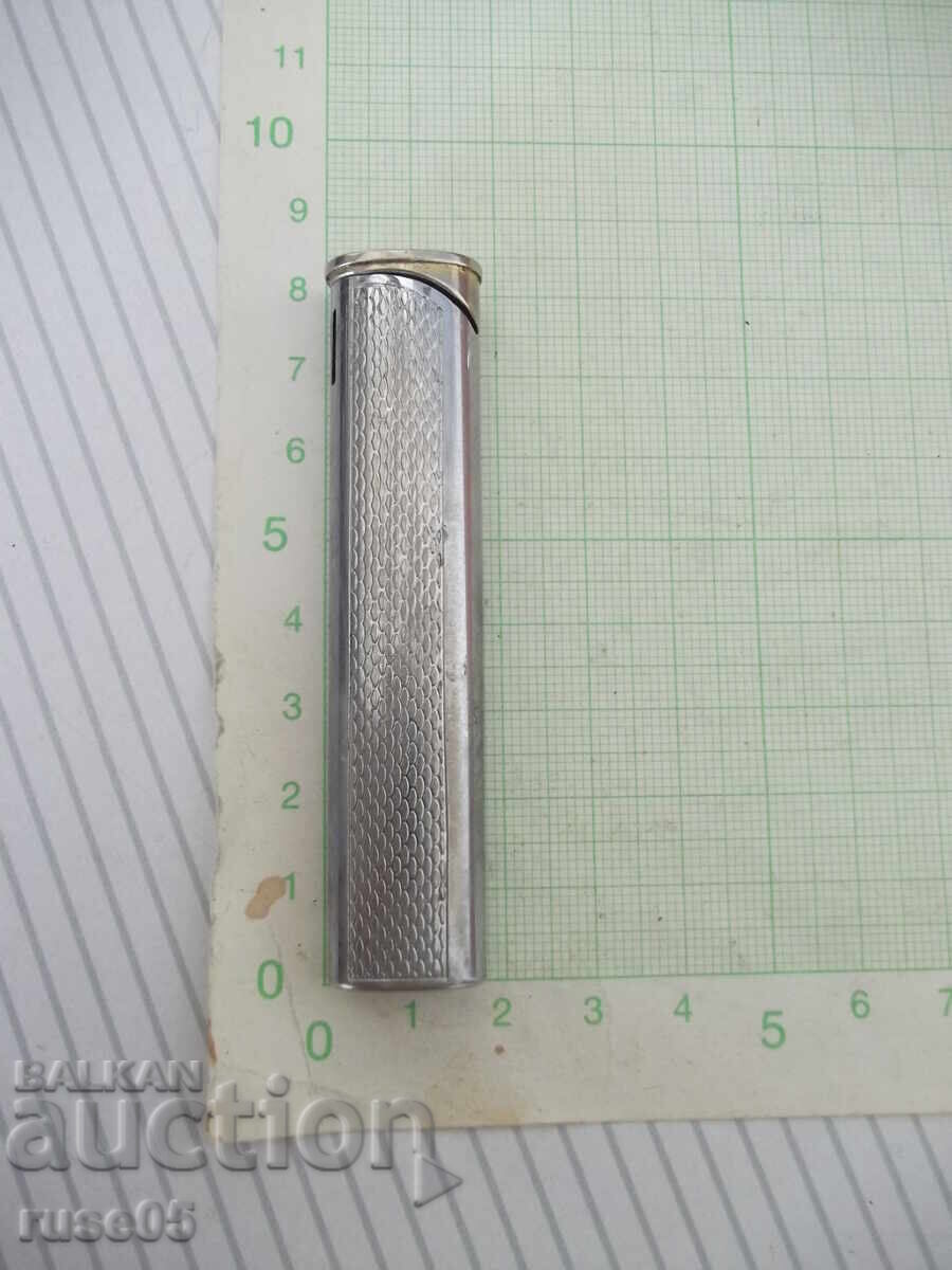 Piezoelectric gas lighter with soft flame - 3