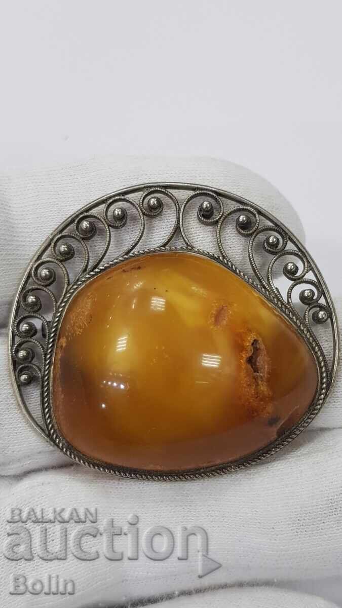 Beautiful old brooch with a huge natural amber piece, Europe