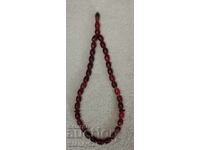Amber prayer beads, red amber