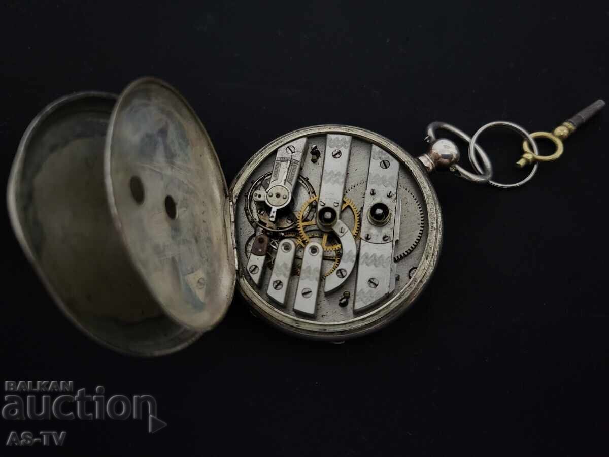 Livrarea Ceas de buzunar argintiu vechi