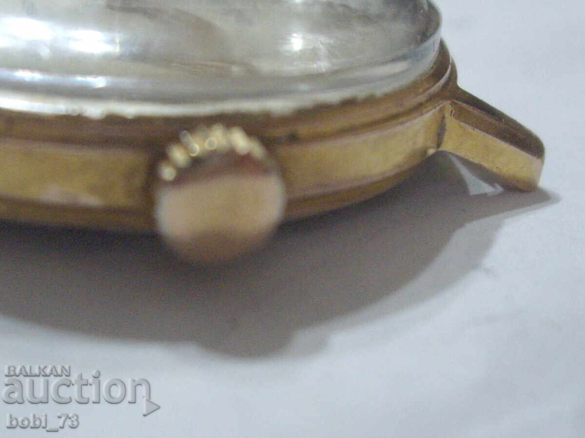 Auction Old Swiss gold-plated watch Auction Old Swiss gold-plated watch