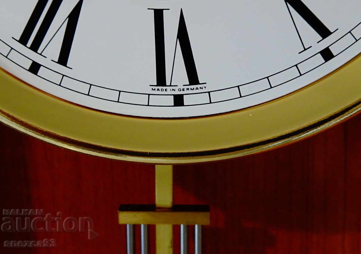 Auction  German wall clock with pendulum, melodic gongs