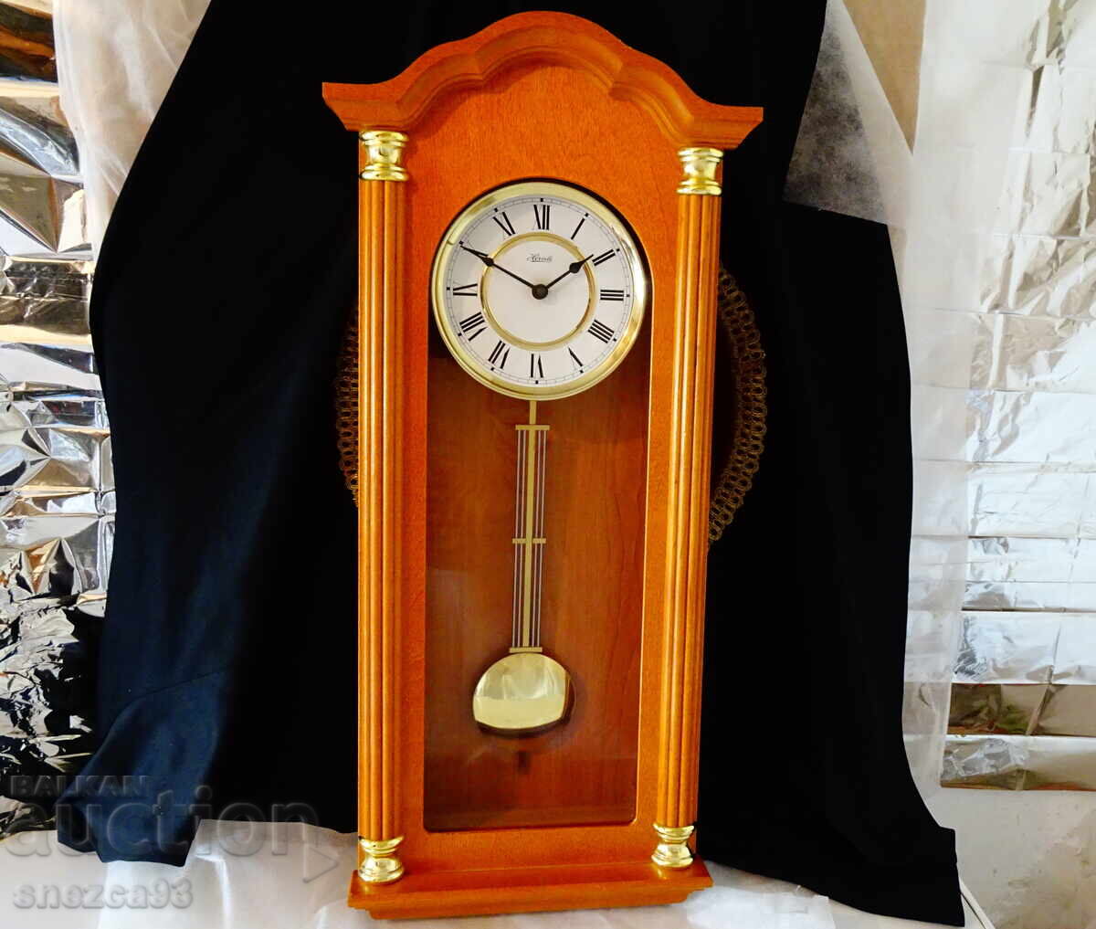 German wall clock with pendulum, melodic gongs
