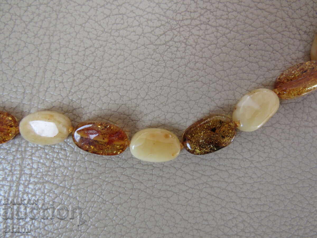 Γυναικείο κολιέ με κύκλο από premium κεχριμπάρι Βαλτικής με τιμή 125.00 BGN | € 63.91 Γυναικείο κολιέ με κύκλο από premium κεχριμπάρι Βαλτικής με τιμή 125.00 BGN | € 63.91